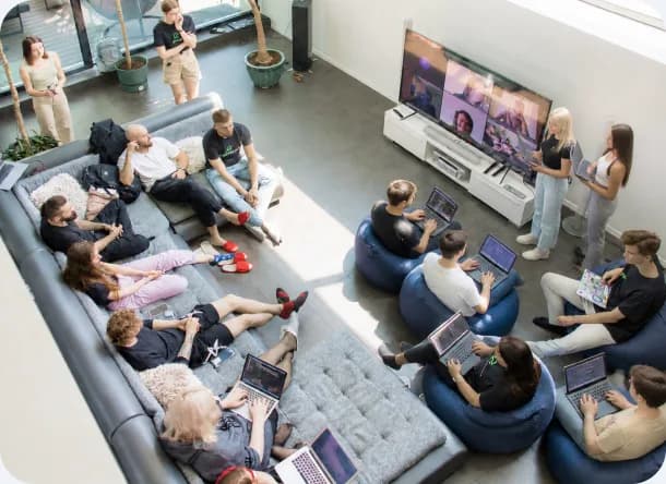 The team working from beanbags during a workshop